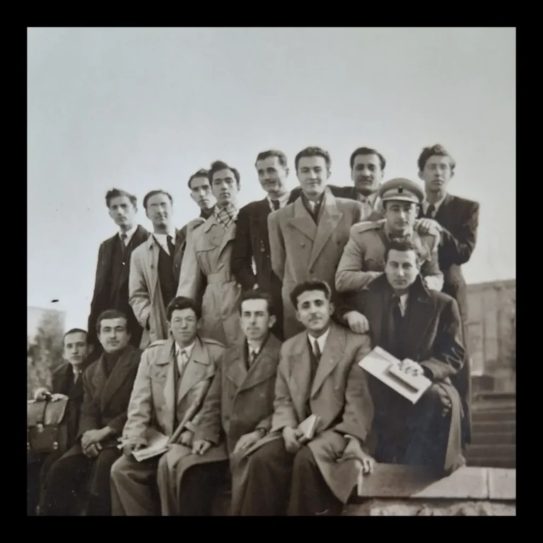Detail showing the faces of students holding books and notebooks