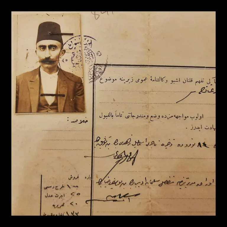 Photograph of the man in a fez on the power of attorney, with the seal over it