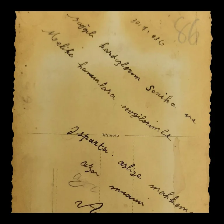Dedication dated 30.7.936 and signature on the back of the photograph