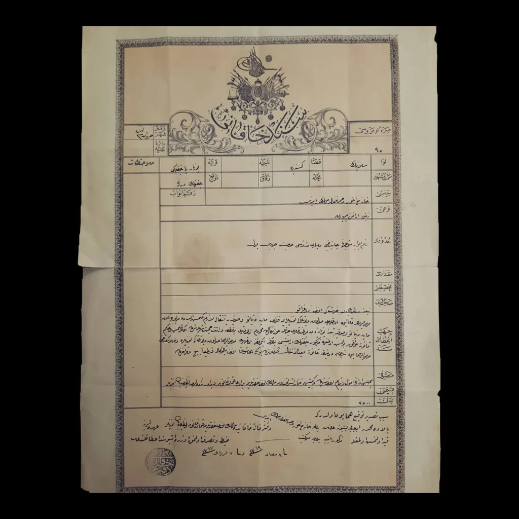 Escritura (tapu) otomana completada a mano y sellada, con encabezado con tugra y escudo de armas