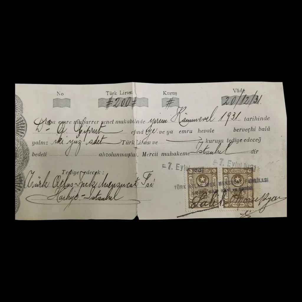 Pagaré a la orden (emre muharrer senet) de 1931 con el sello de la Fábrica de Tejidos de Seda Türk Atlas y timbres fiscales