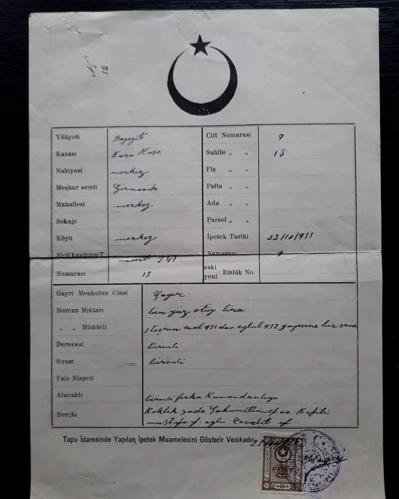 Ay yıldızlı, matbu tablolu ipotek vesikası; el yazısı kayıtlar, damga pulu ve mühür